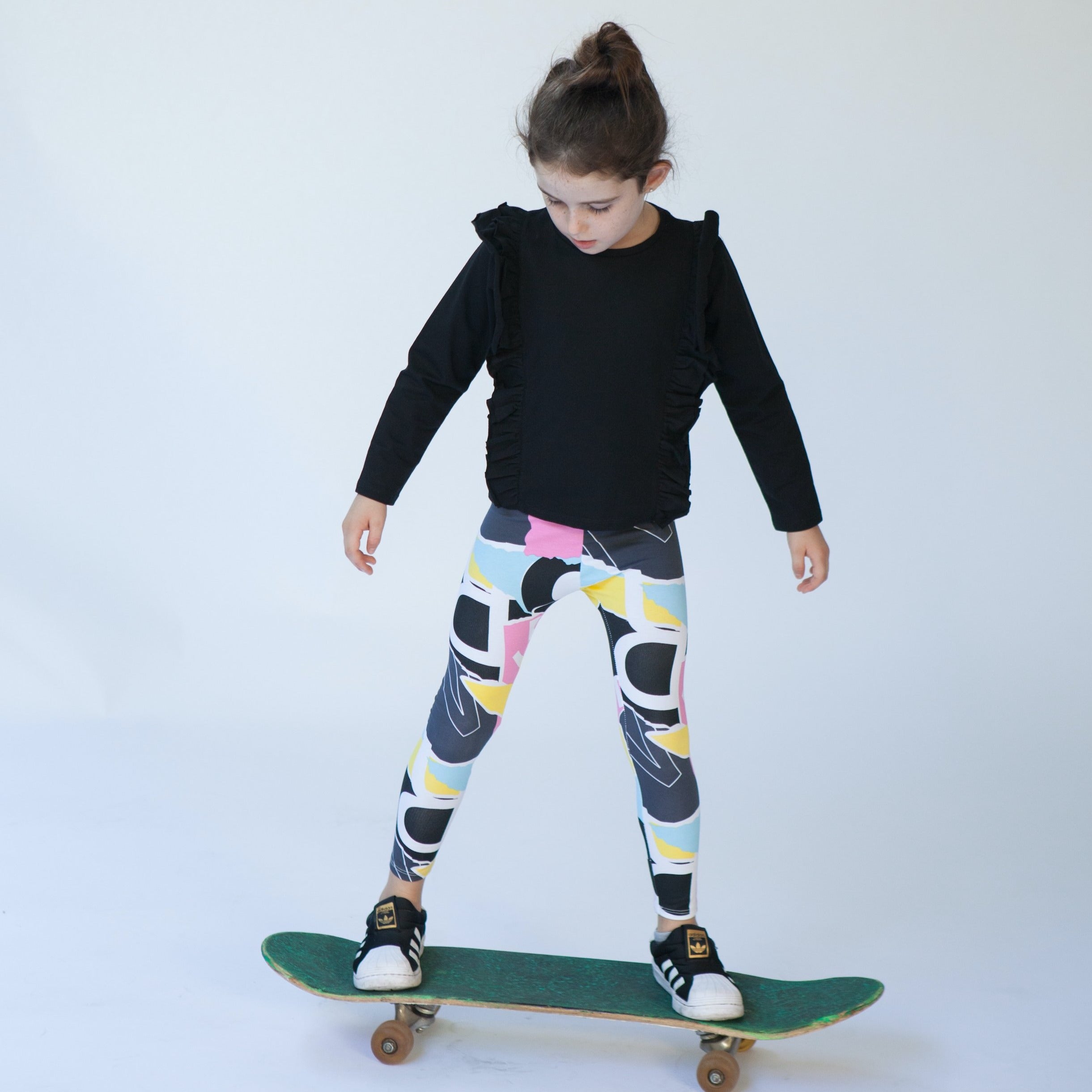 เสื้อระบายข้างสีดำ AB